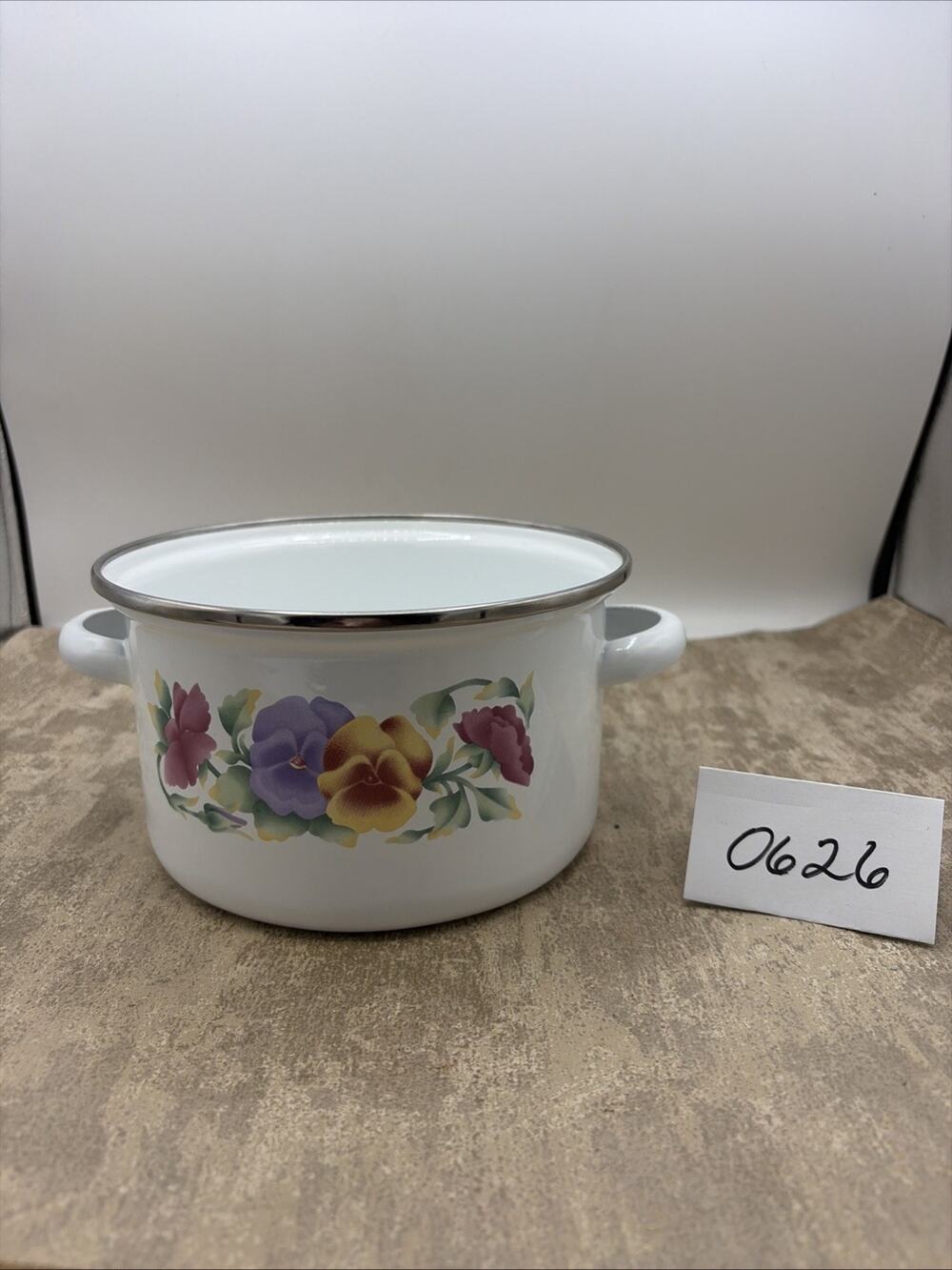 1 Enamelware Stove Top Sauce Pot. White with a Floral Pattern Design. 7” W 4” T